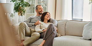 A couple sitting in a converted garage